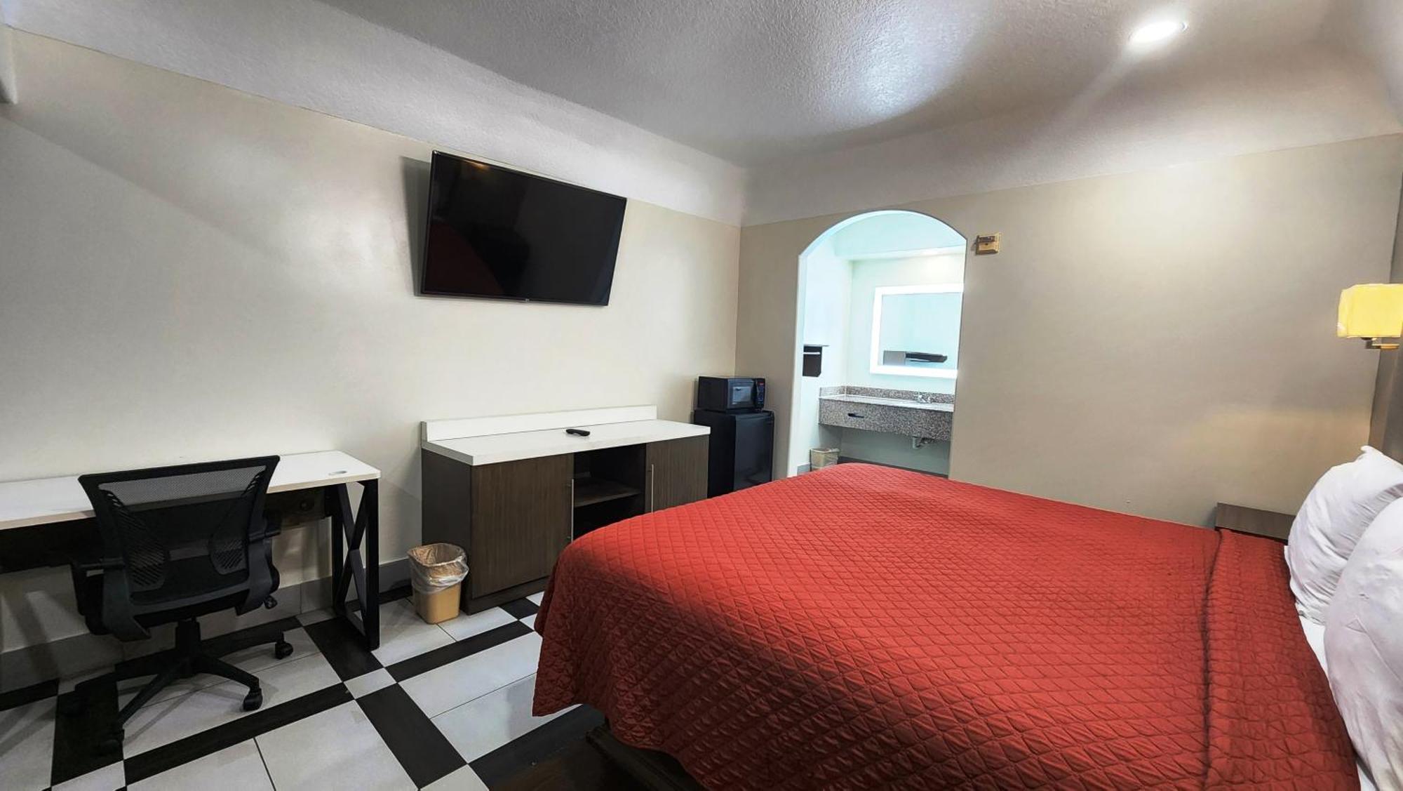 Scottish Inn & Suites Sam Houston Parkway Eksteriør bilde